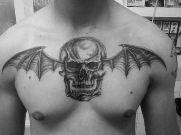 Guy With Deathbat Shaded Black And Grey Ink Tattoo On Chest
