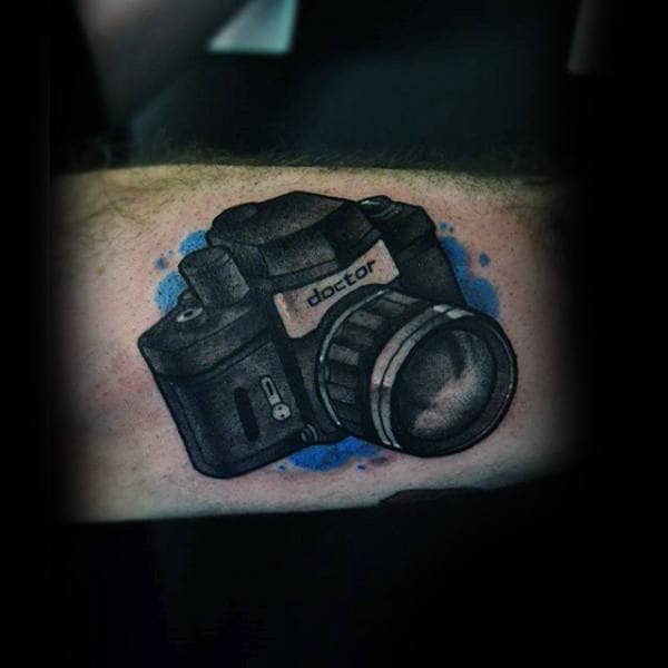 Guy With Doctor Camera Tattoo On Forarms