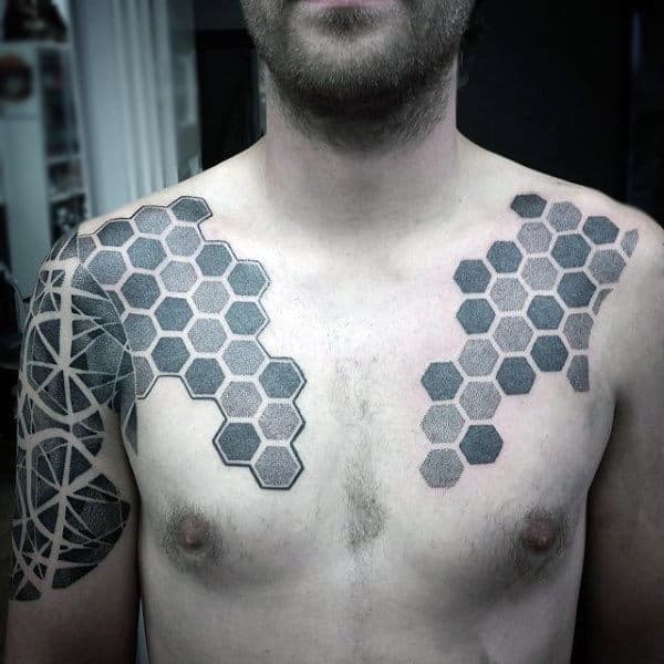 Guy With Dull Grey Honeycomb Tattoo On Shoulders