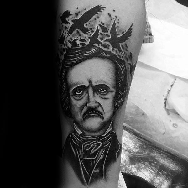 Blackwork tattoo of Edgar Allan Poe with a sorrowful expression, surrounded by flying ravens and bold shadows above his head.