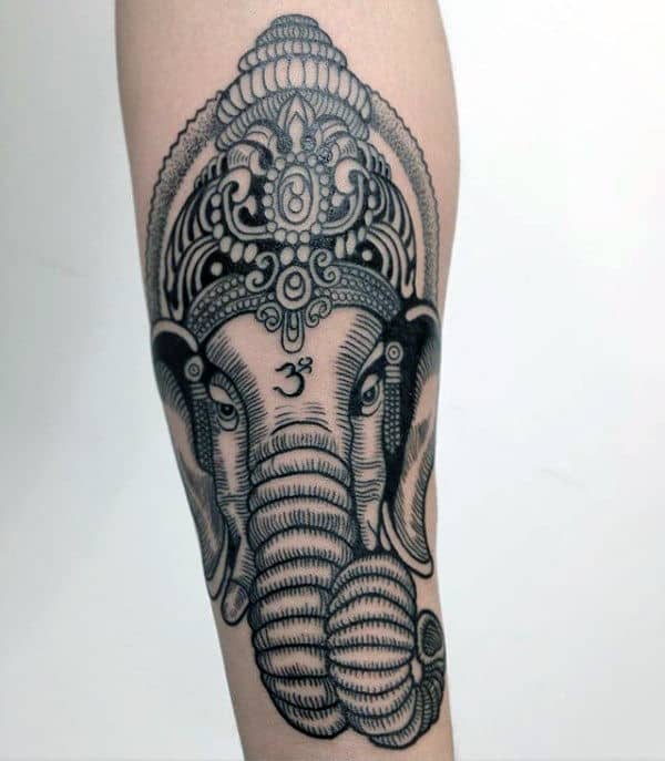 Guy With Forearm Tattoo Design Of Ganesha
