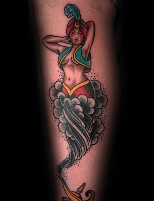 Tattoo of a stylized genie lamp with a red-turbaned genie emerging