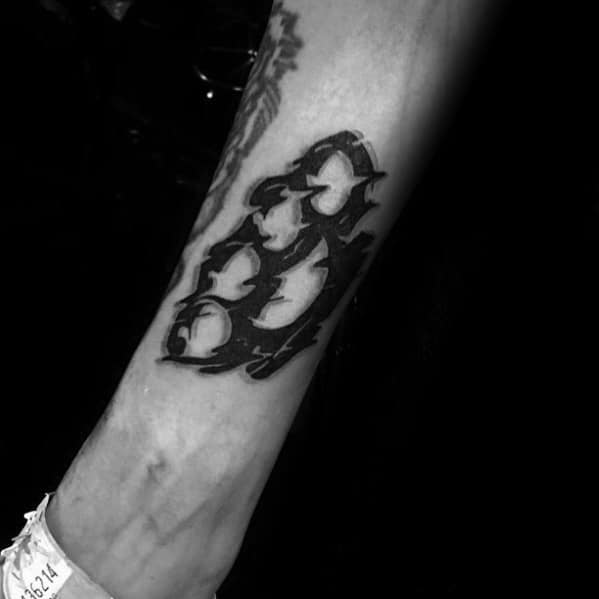 Glitch-style tattoo of flying birds in silhouette with fragmented outlines and a motion blur effect, placed on the forearm