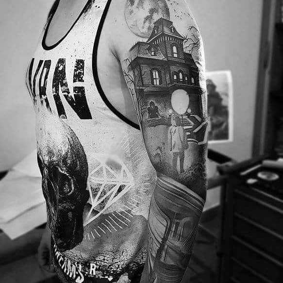Gothic horror sleeve tattoo featuring a haunted house, eerie faceless figure, full moon, and dark surreal elements in black and grey realism.