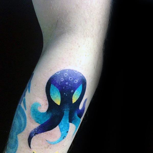 Vibrant gradient tattoo of a stylized octopus in shades of purple, blue, and teal with glowing yellow eyes and soft highlights.