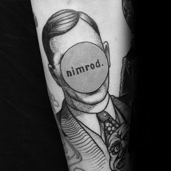 Black and grey tattoo of a faceless man in a suit with a circle over his face reading “nimrod.”, inspired by Green Day’s album cover.