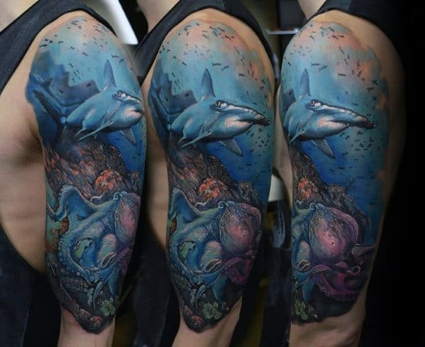 Guy With Half Sleeve Shark Ocean Tattoo Design