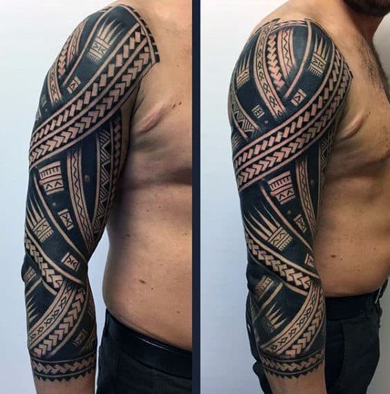 Guy With Half Sleeve Upper Arm Tribal Tattoos