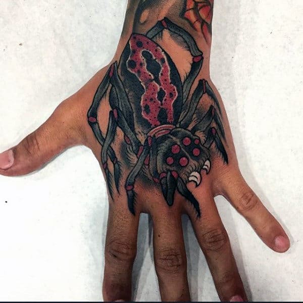 Guy With Hideous Spider Tattoo On Hands