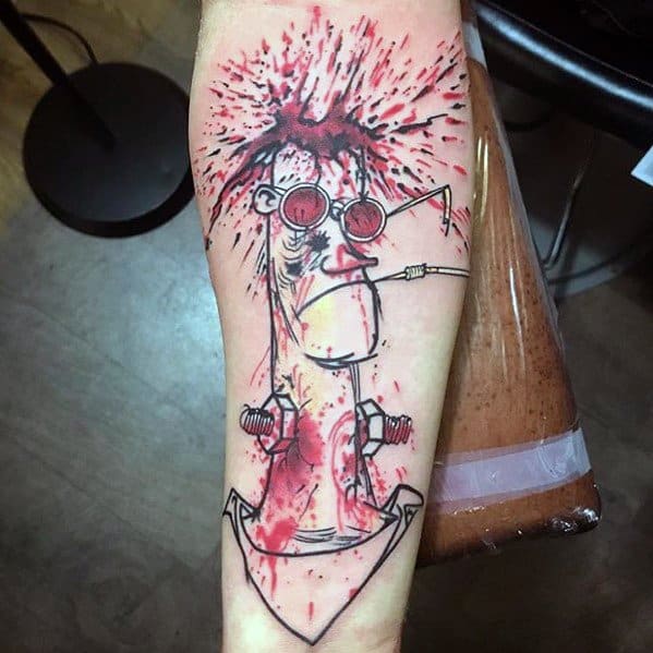 Abstract Hunter S. Thompson tattoo featuring a cartoonish character with aviator glasses, a cigarette, and an explosive splatter effect in red ink.
