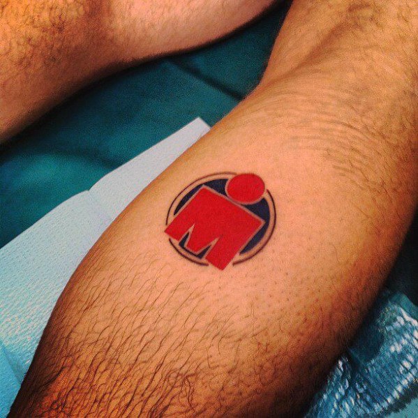 Tattoo featuring the Ironman logo in red, encircled by a bold outline, symbolizing strength and perseverance in the race.