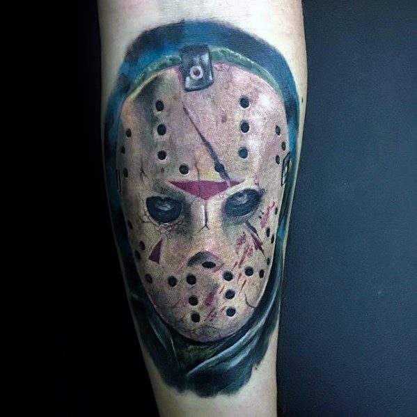 Guy With Jason Mask Tattoo Design On Inner Forearm