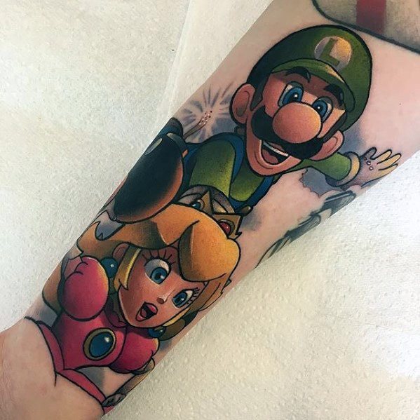 Colorful tattoo of Luigi and Princess Peach in an action scene, with Luigi excitedly leading and Peach appearing surprised, inked on the forearm.