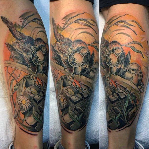 Guy With Magnificient Sparrow Tattoo On Lower Legs