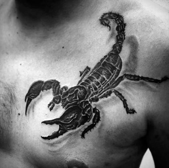 Guy With Merciless Scorpion Tattoo On Chest