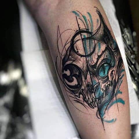 Guy With Modern Watercolor Tattoo On Forearm