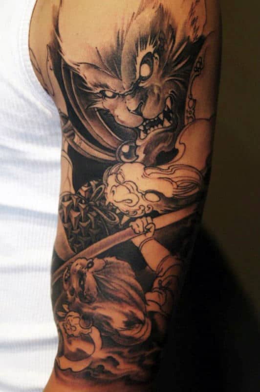 Guy With Monkey King Black Ink Shaded Half Sleeve Tattoo