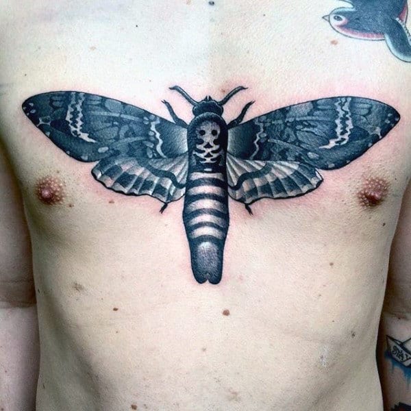 Guy With Moth Tattoo On Chest