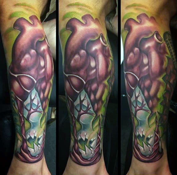 Guy With New School Tattoo On Calves