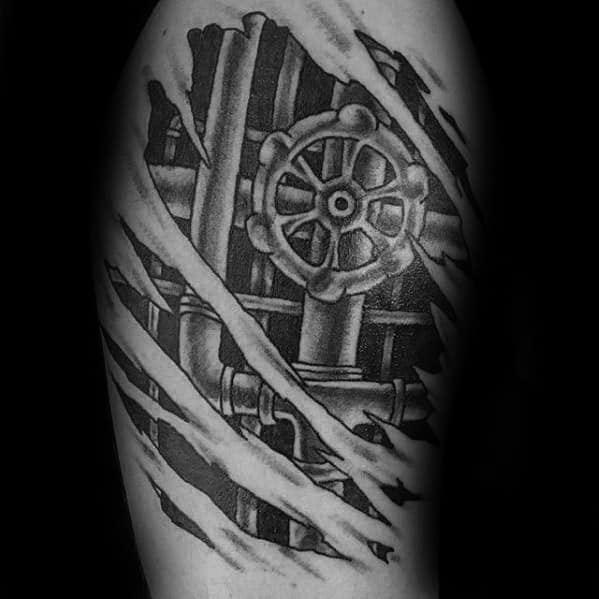 Black and grey tattoo of exposed plumbing pipes and a valve handle, designed to look like it's beneath torn skin.