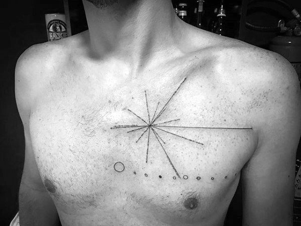 Minimalist tattoo on a man's chest featuring geometric lines and dots, inspired by the Pulsar Map. Black and white image