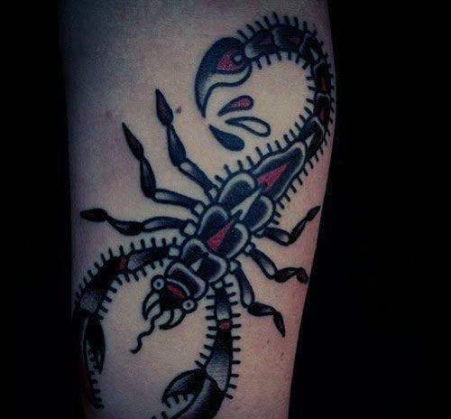Guy With Red And Black Ink Scorpion Traditional Forearm Tattoo
