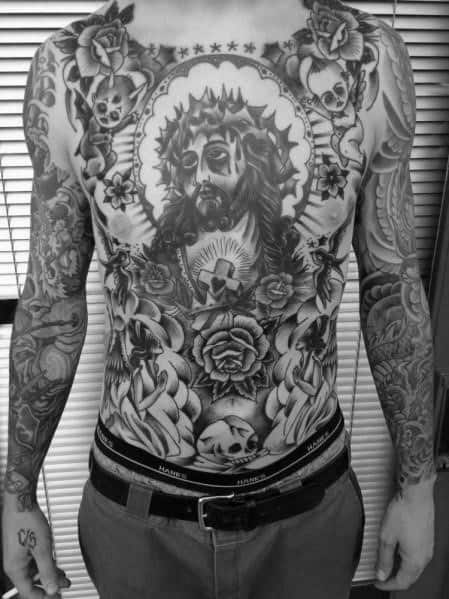 Guy With Religious Traditional Themed Tattoo On Chest