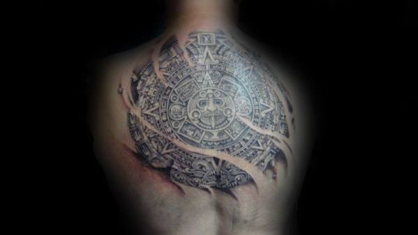 Guy With Ripped Skin Back Mayan Calender Tattoo Design