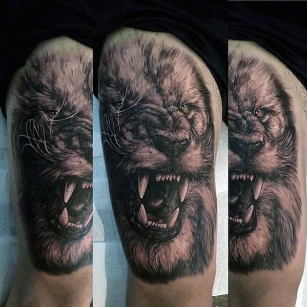 Guy With Roaring Lion Realistic Thigh Tattoo
