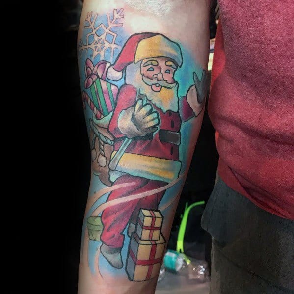 Colorful Santa Claus tattoo in a cartoon style, featuring Santa joyfully delivering gifts with a festive background of snowflakes and presents.