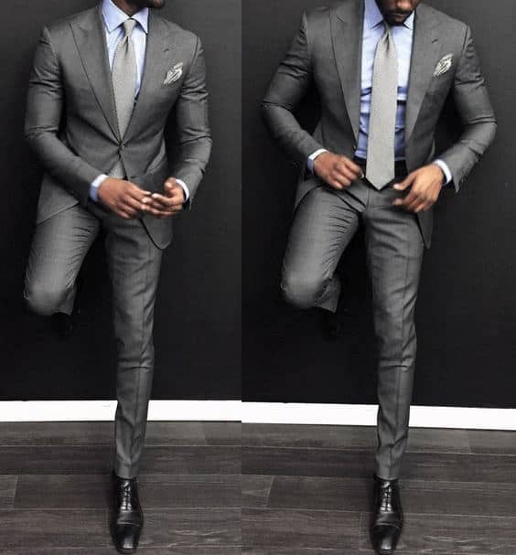 Guy With Sharp Looking Light Blue Dress Shirt Charcoal Grey Suit And Tie Black Shoes Outfit