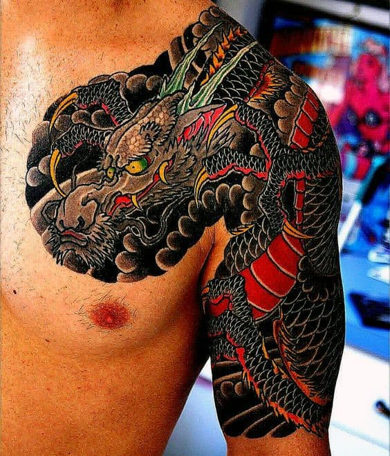 Guy With Shiny Red And Black Japanese Sleeve Tattoo