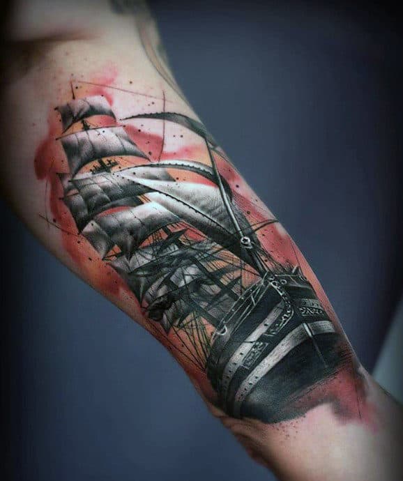 Guy With Ship Tattoo On Quarter Sleeve