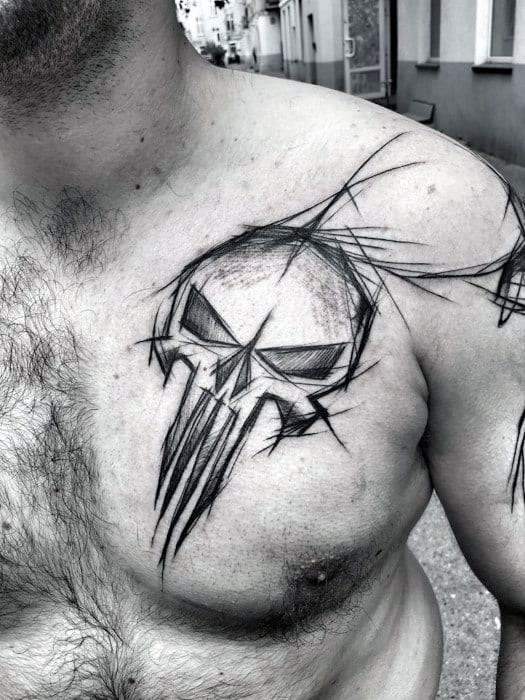 Guy With Sketched Punisher Skull Tattoo Design On Chest