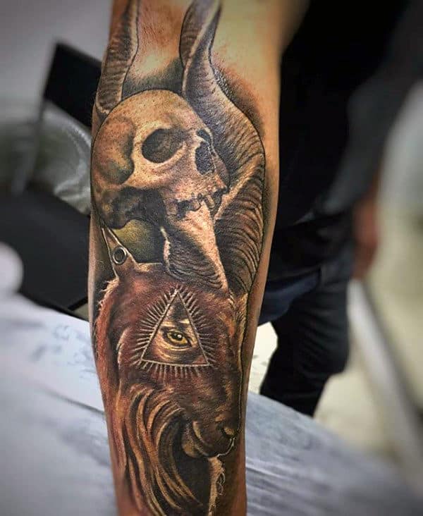 Guy With Skull And Goat Forearm Sleeve Tattoo