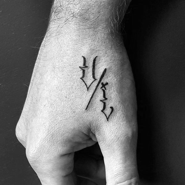 Guy With Small Decorative Letters Badass Hand Tattoo