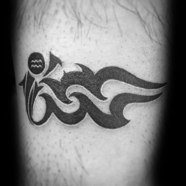 Guy With Small Tribal Aquarius Astrological Sign Tattoo