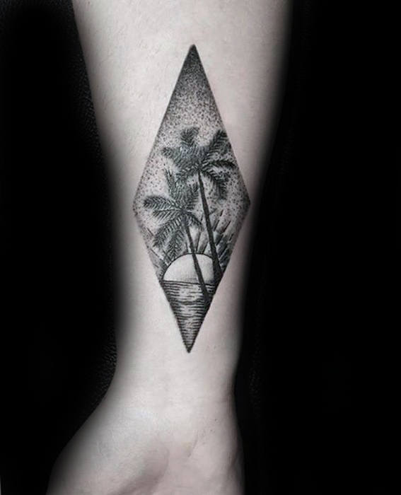 Guy With Sunset Palm Tree Small Inner Forearm Tattoo