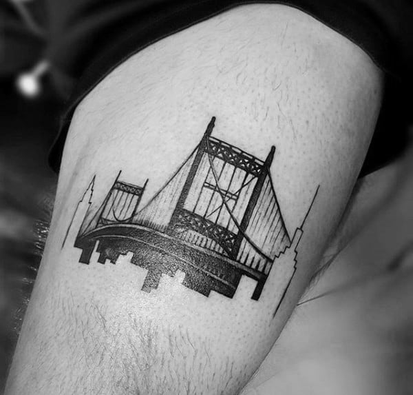 Guy With Thigh Bridge Tattoo