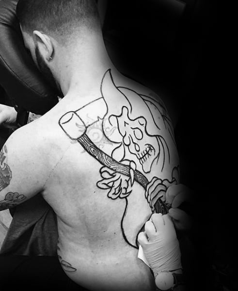 Guy With Traditional Reaper Tattoo Design On Back