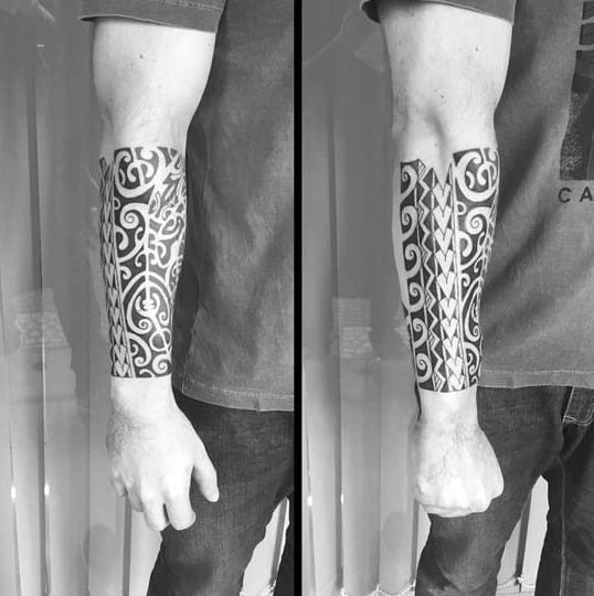 Guy With Tribal Creative Forearm Sleeve Tattoo Design
