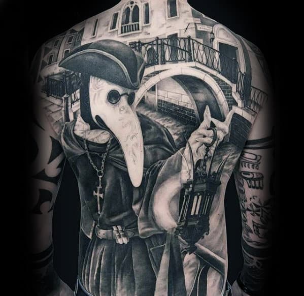 Guy With Unique Cool Bridge And Religious Themed Full Back Tattoos