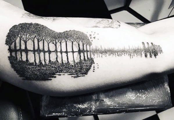 Guy With Unusual Tree Soundwave Arm Tattoo