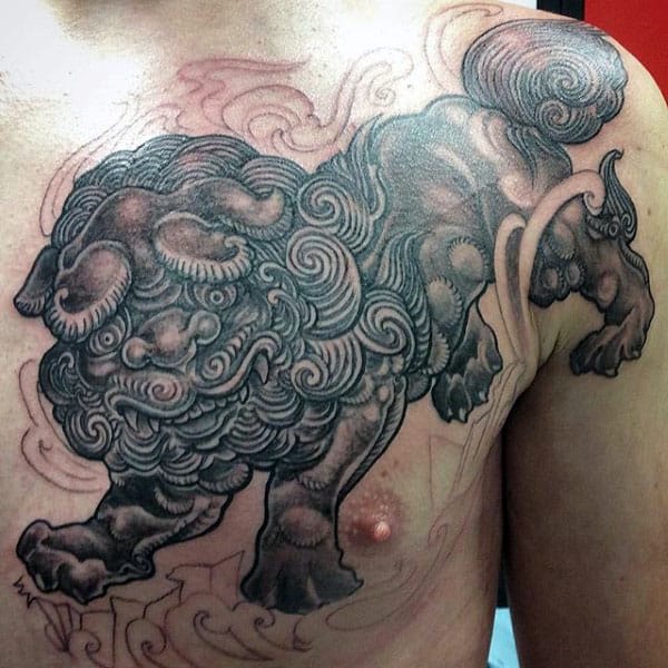 Guy With Upper Chest Foo Dog Tattoo