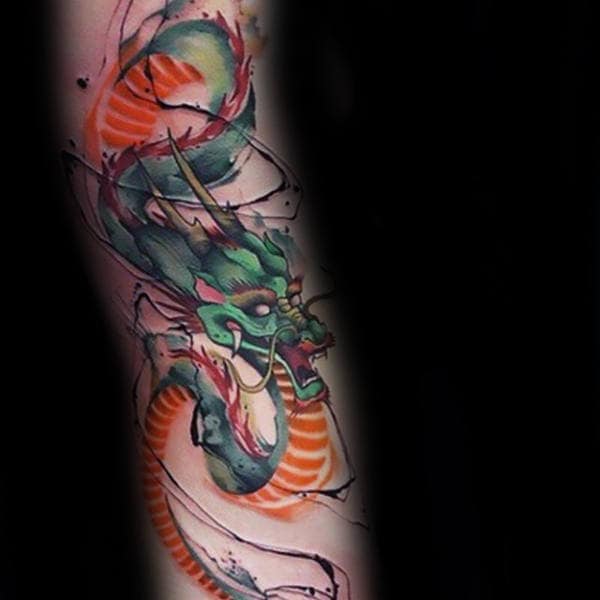 Guy With Watercolor Chinese Dragon Forearm Tattoo