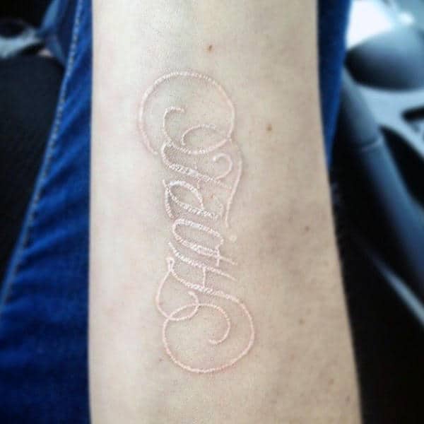 Guy With White Ink Ambigram Wrist Tattoo