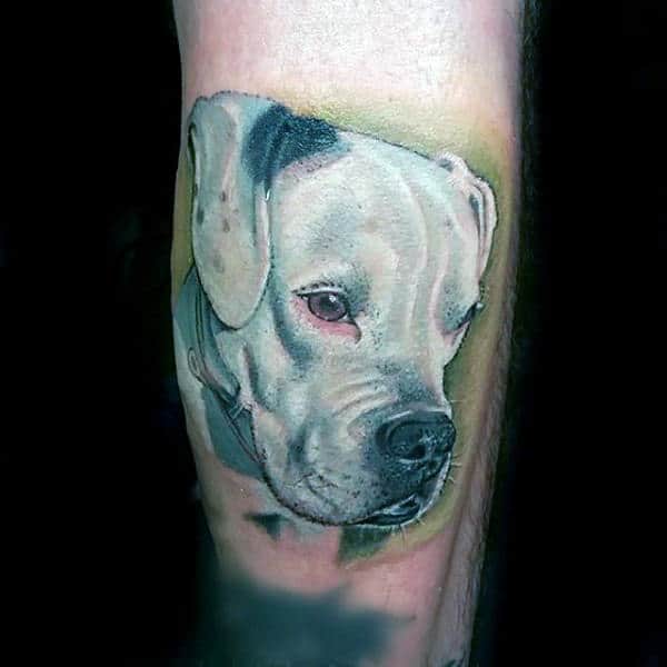 Guy With White Ink Dog Tattoo On Outer Arm