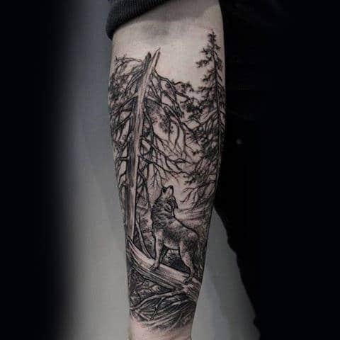 Guy With Wolf Howling In The Woods Tree Sleeve Tattoo