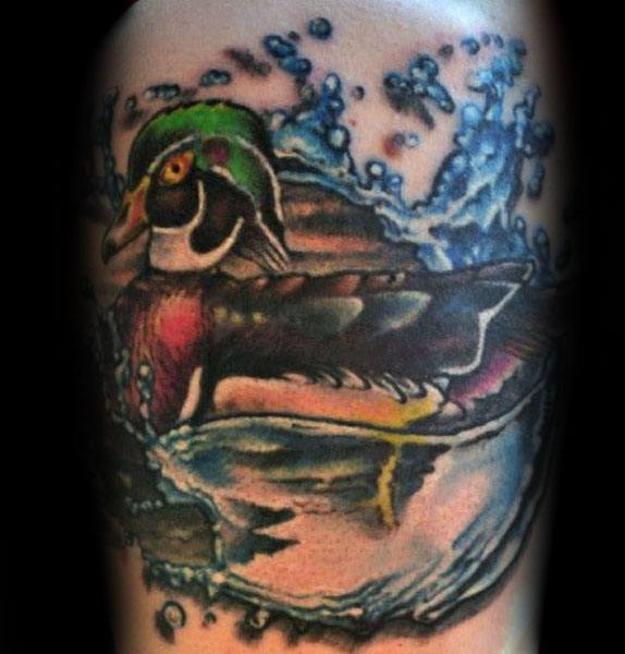 Guy With Wood Duck Tattoo Design On Arm