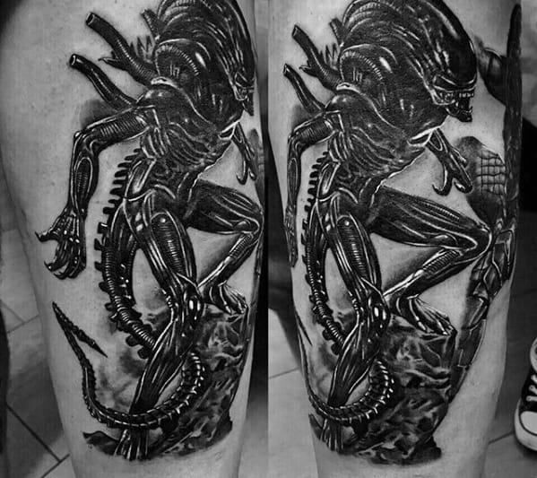 Bold black and grey Xenomorph tattoo in dynamic motion, showcasing sharp claws, detailed tail, and biomechanical body design.